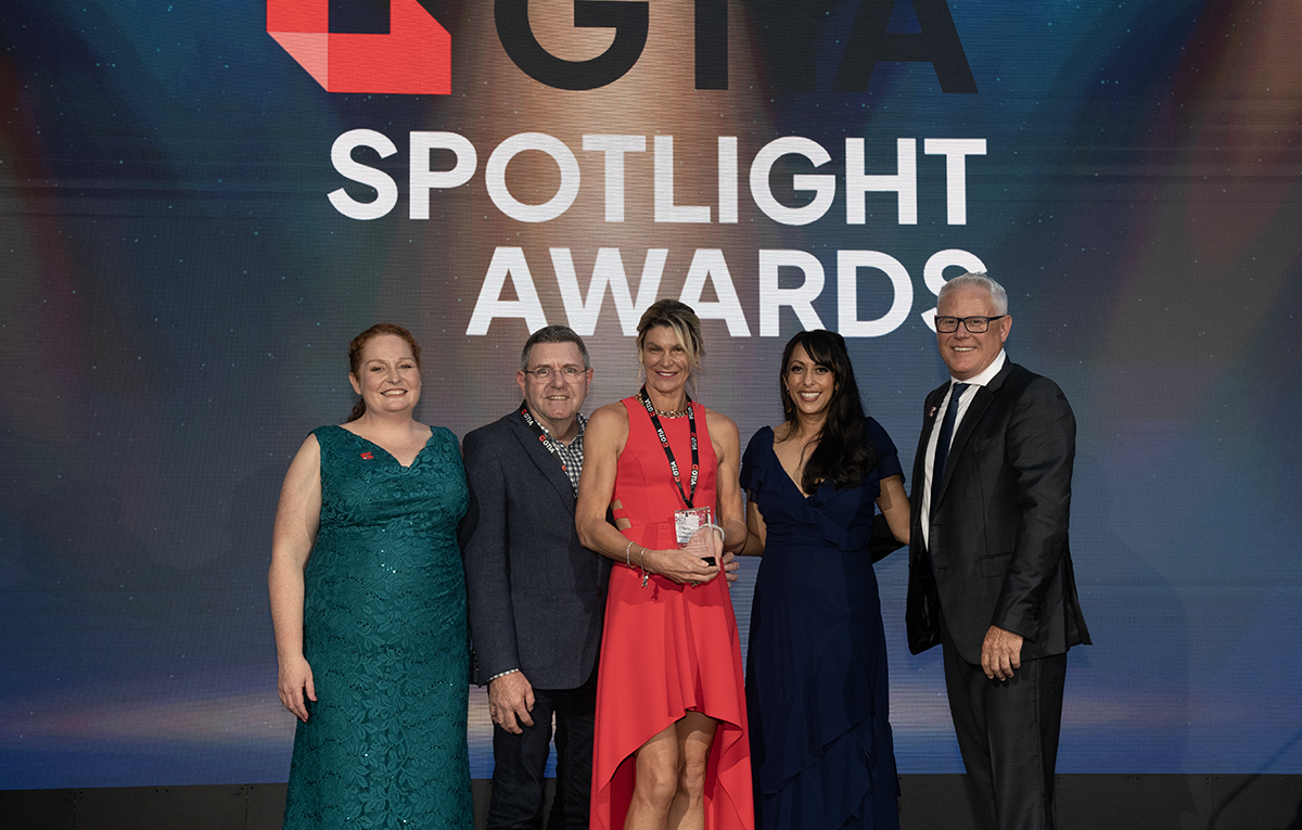 Fabric Brand Partners accepts the GTIA Spotlight Award