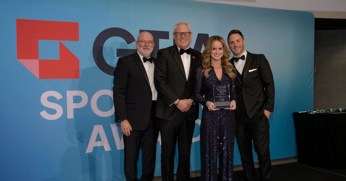Crystal Conkle accepts the GTIA Spotlight Award