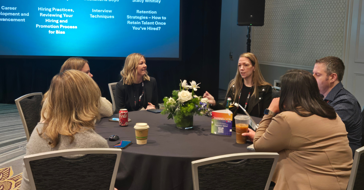 GTIA Advancing Women in Technology Interest Group members collaborate at a table