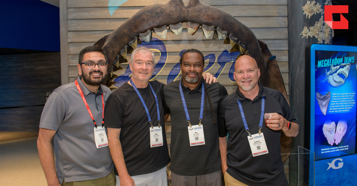 Four team members hanging out at ChannelCon together.