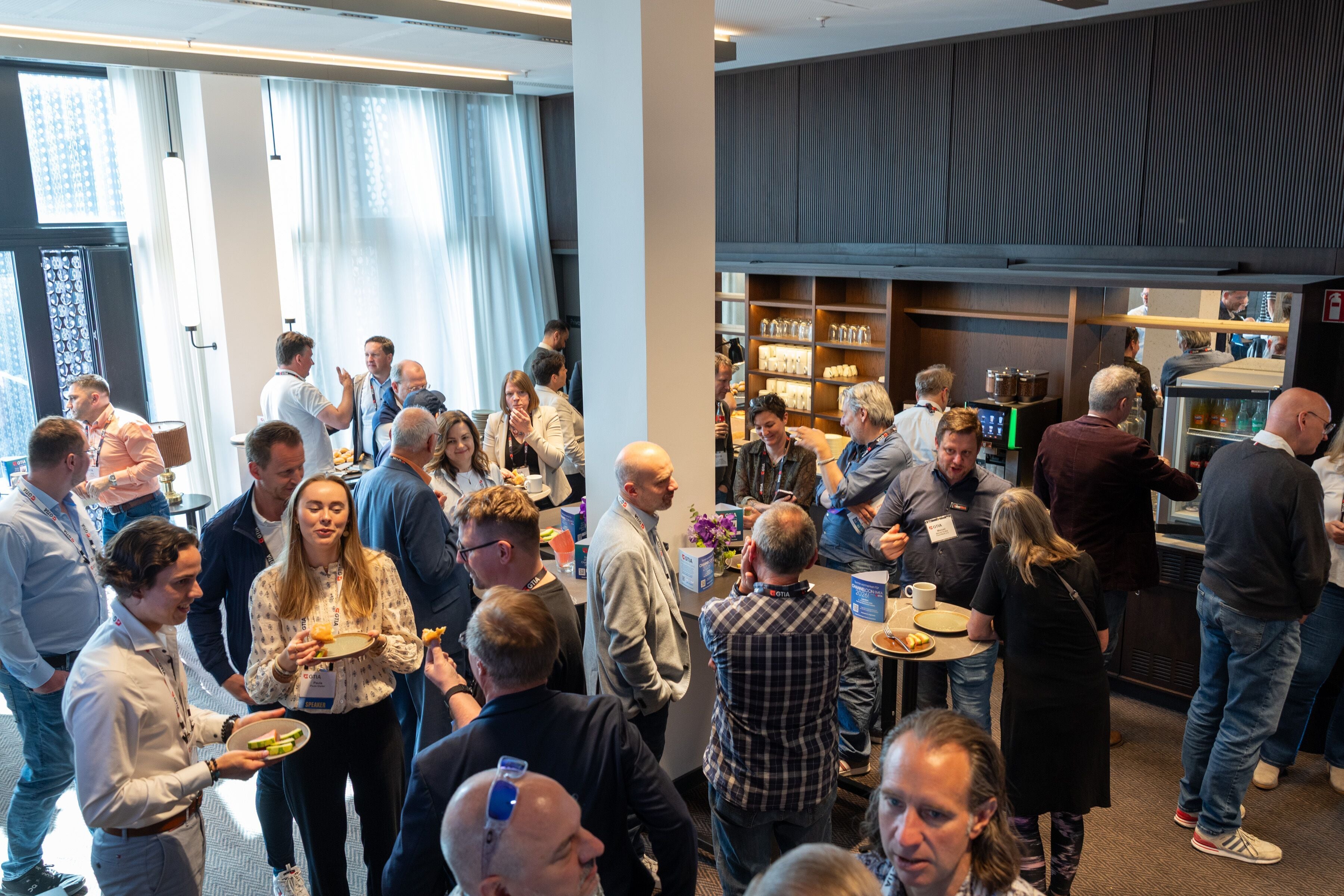 A group of people networking at a GTIA event
