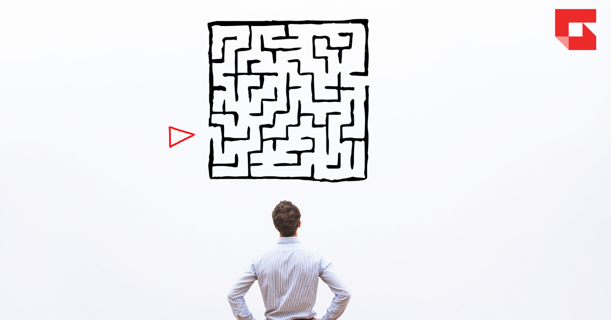 Man looking at a maze.